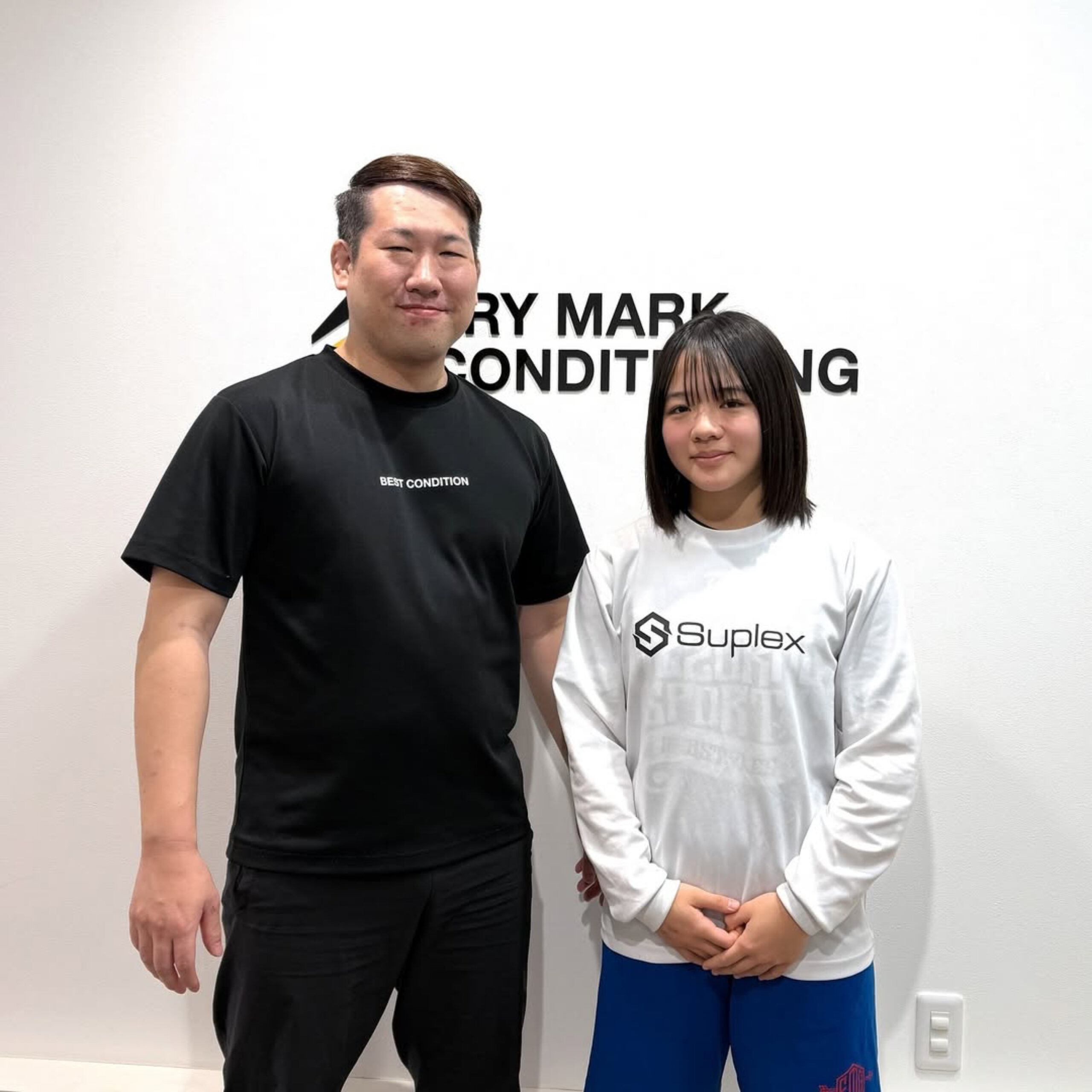 サポート中の保坂選手とトレーナー