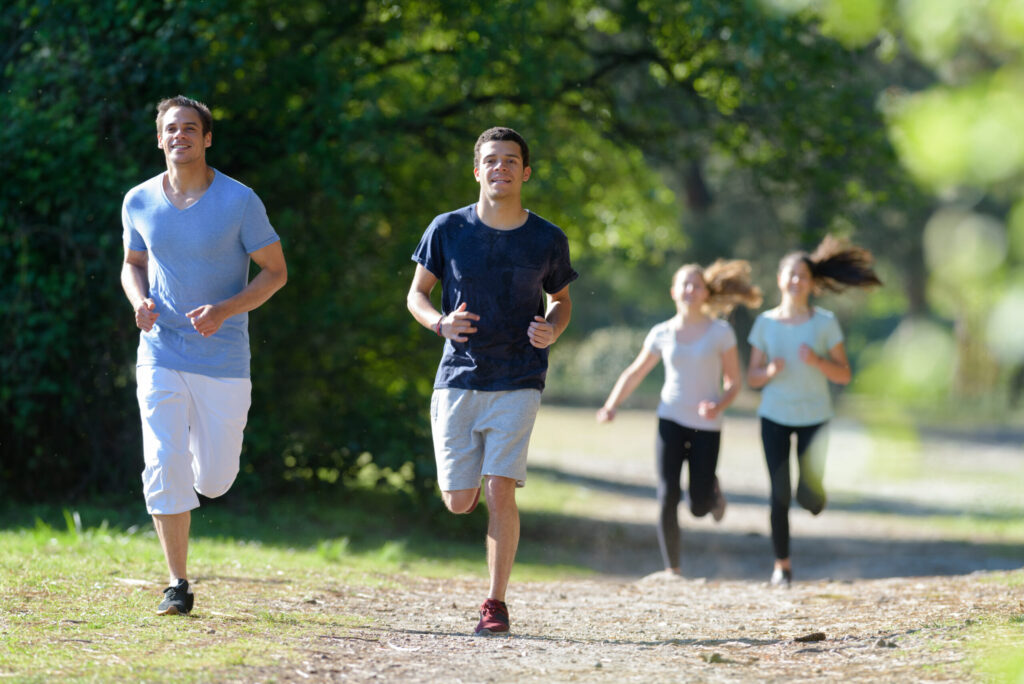 people running in a park
